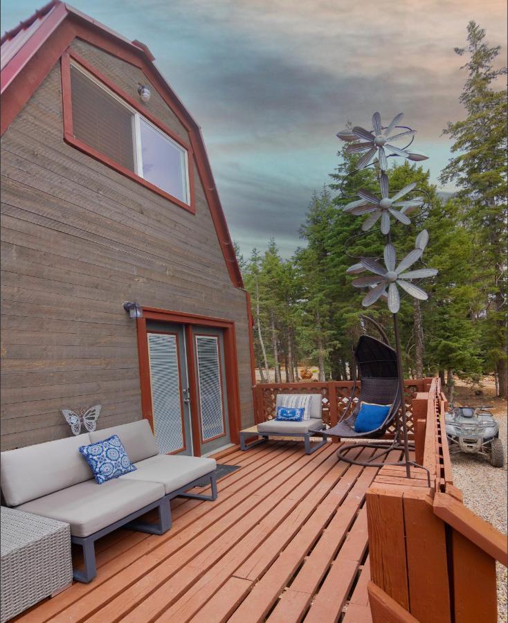 Charming Blue Farmhouse Cabin Duck Creek Village Bagian luar foto